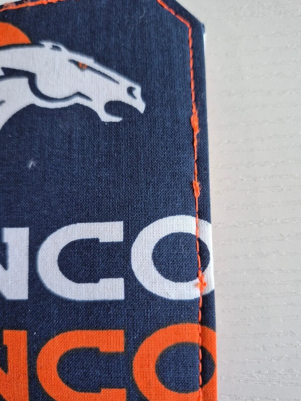 football wallet orange and blue magnetic snap tab 6 card slot wallet